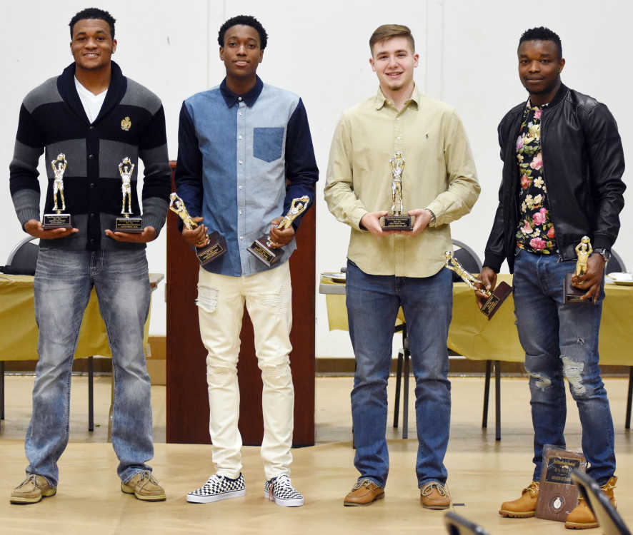 Raiders reflect, look forward during annual basketball banquet